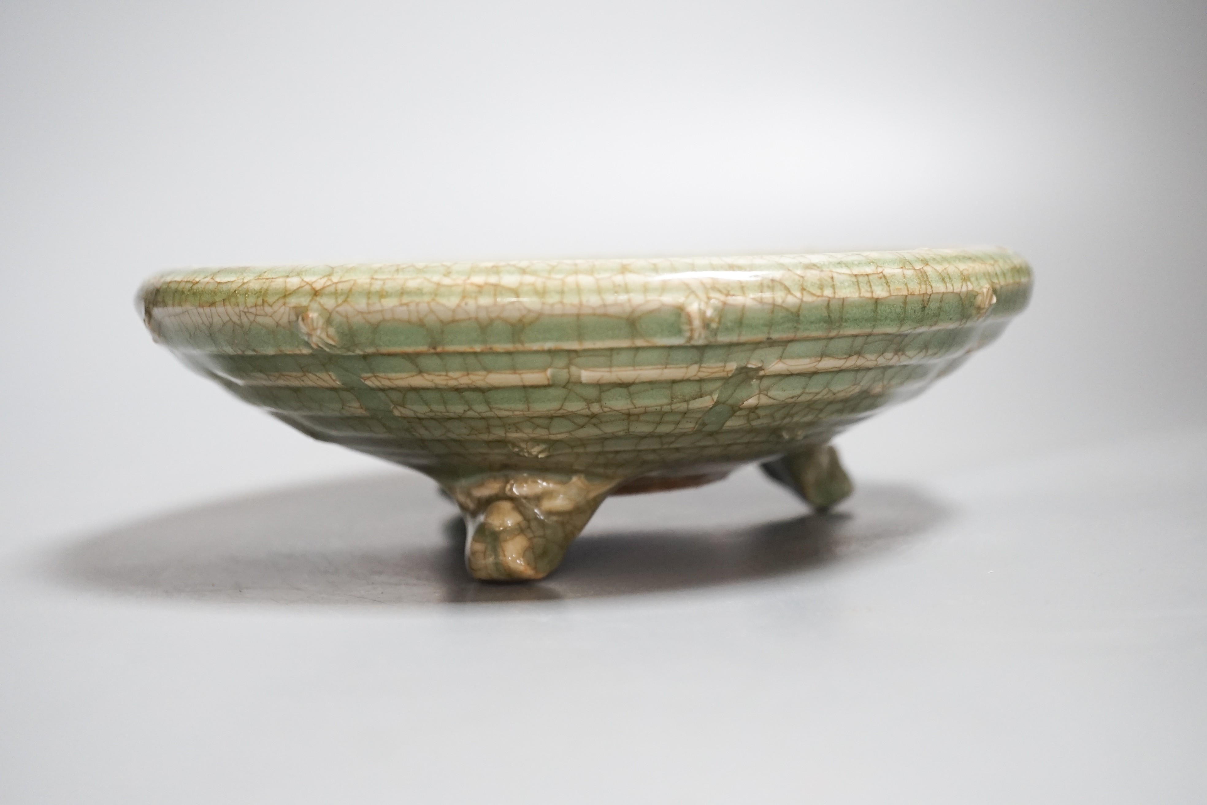 A Chinese celadon tripod censer, possibly Ming dynasty, 20.5cm